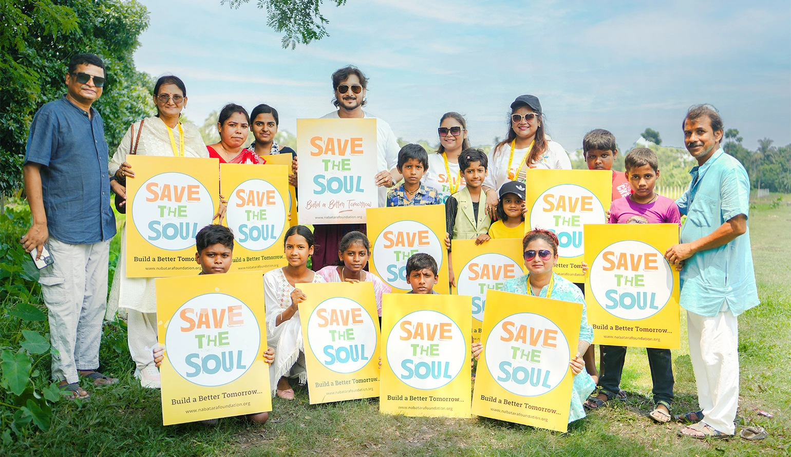 NGO volunteer teaching underprivileged children during community program at Nabatara Foundation India