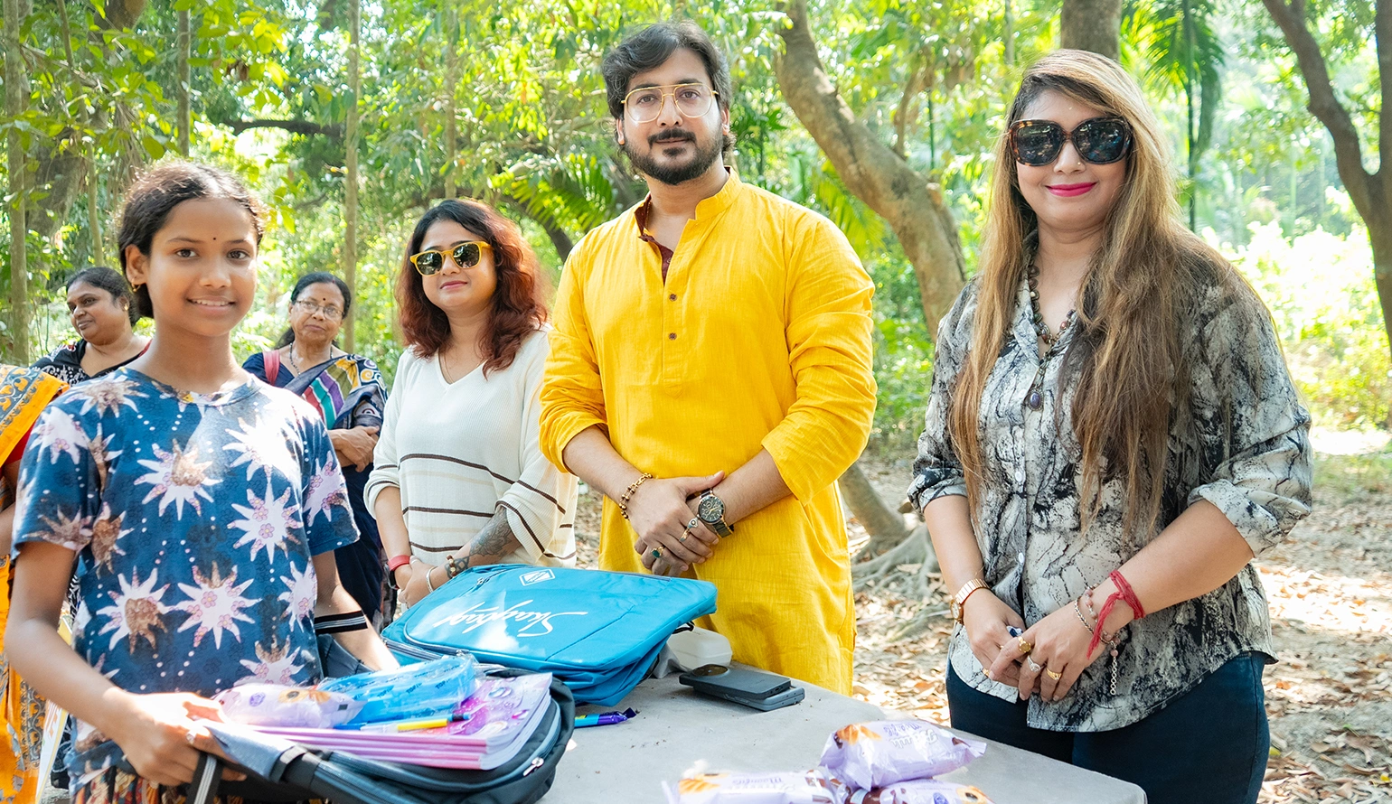 Students volunteering in NGO programs in India helping children and elderly with Nabatara Foundation